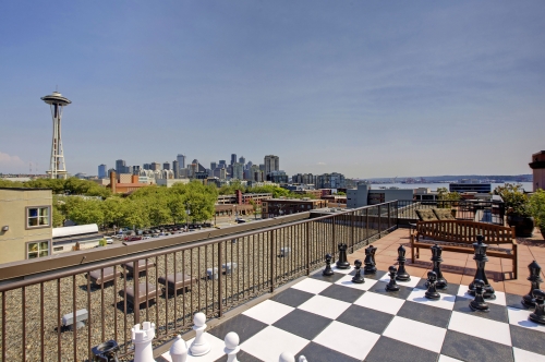 Rooftop terrace complete with fire pit, BBQ stations, and giant sized chess set